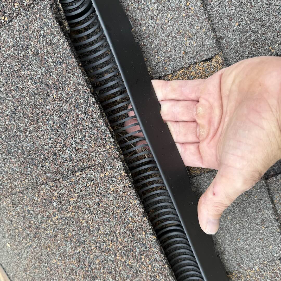 Wildlife exclusion barrier installed along a roofline to block animal entry on a Kalamazoo home